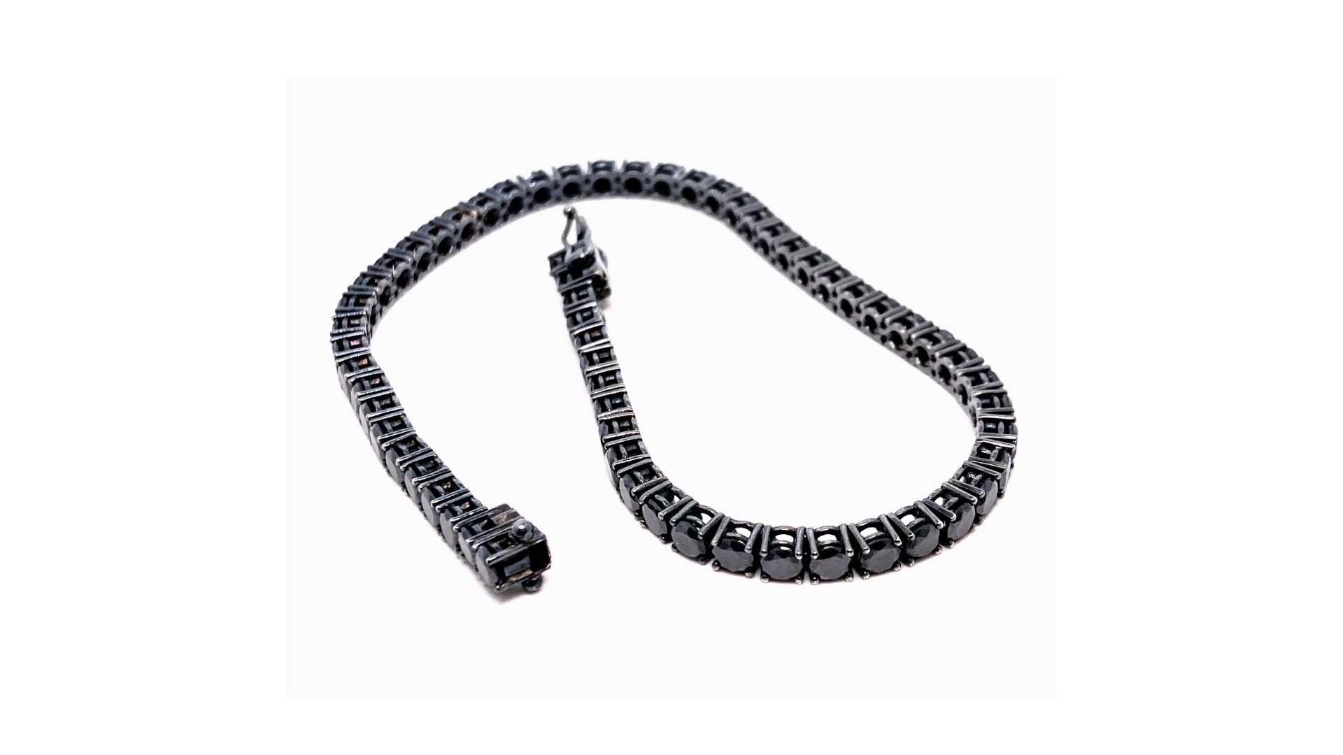 Bracciale Tennis in oro bianco con diamantini neri
